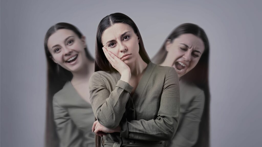 Ilustramos nessa imagem uma mulher bipolar, tendo variações de humor do seu transtorno